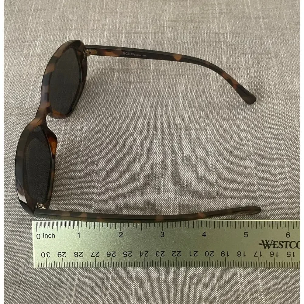 New BCBGeneration Womens Polarized Brown Tortoise Shell Oval Sunglasses